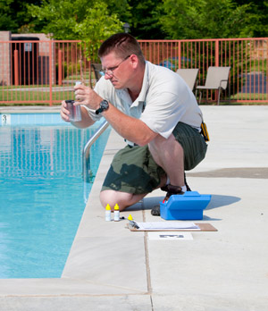 Bullfrog Spa services: water testing at Poolside